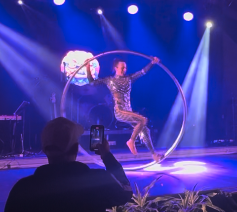 Cyr wheel cirque performer at Super Bowl Host Committee event